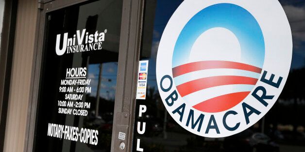 An Obamacare logo is shown on the door of the UniVista Insurance agency in Miami, Florida on January 10, 2017. As President-elect Donald Trump's administration prepares to take over Washington, they have made it clear that overturning and replacing the Affordable Care Act is a priority. / AFP / RHONA WISE (Photo credit should read RHONA WISE/AFP/Getty Images)
