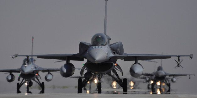 Turkish Air Force F-16C/D Block 52+ aircraft taxiing on the runway at Konya Air Base, Turkey, during Exercise Anatolian Eagle 2014.