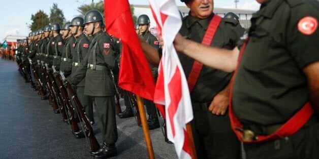 Turkish soldiers take part in a military parade during celebrations marking the 33rd anniversary of the foundation of the self-proclaimed Turkish Republic of Northern Cyprus (TRNC) on November 15, 2016, in the northern part of Nicosia. / AFP / Florian CHOBLET (Photo credit should read FLORIAN CHOBLET/AFP/Getty Images)