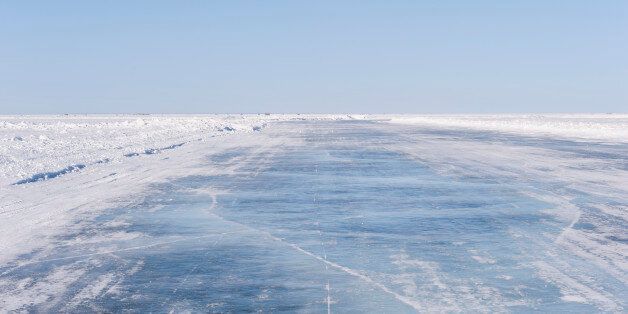 Plowed ice lake road in Minnesota.