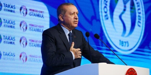 ISTANBUL, TURKEY - JANUARY 14: Turkish President Recep Tayyip Erdogan delivers a speech during a ceremony held for the 143rd foundation anniversary of Borsa Istanbul (Turkish Stock Exchange) and its opening of new buildings in Istanbul, Turkey on January 14, 2017. (Photo by Kayhan Ãzer/Anadolu Agency/Getty Images)