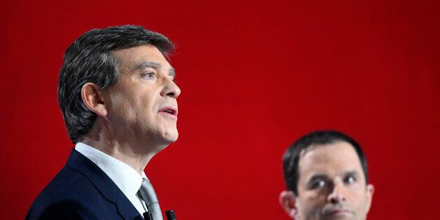 Former French ministers and candidates Arnaud Montebourg (L) and Benoit Hamon attend the second prime-time televised debate for the French left's presidential primaries in Paris, France, January 15, 2017. REUTERS/Bertrand Guay/Pool