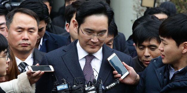SEOUL, SOUTH KOREA - JANUARY 18: Lee Jae-Yong, vice chairman of Samsung, leaves after attending a court hearing at the Seoul Central District Court on January 18, 2017 in Seoul, South Korea. An arrest warrant for issued for Lee, Samsung's de facto leader, on charges of bribery in connection with the scandal that has led to President Park Geun-hye's impeachment. (Photo by Chung Sung-Jun/Getty Images)