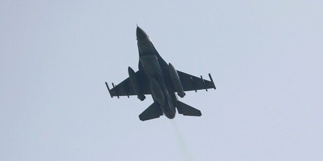 A Turkish F-16 fighter jet takes off from Incirlik airbase in the southern city of Adana, Turkey, July 27, 2015. Turkey attacked Kurdish insurgent camps in Iraq for a second night on Sunday, security sources said, in a campaign that could end its peace process with the Kurdistan Workers Party (PKK). REUTERS/Murad Sezer