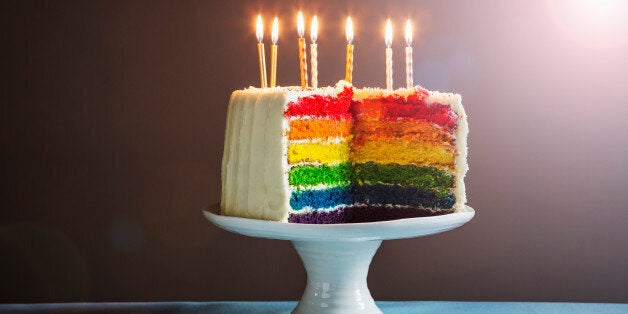 Birthday cake cut, with candles.