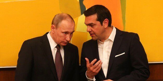 ATHENS, GREECE - MAY 27: Russian President Vladimir Putin (L) and Greek Prime Minister Alexis Tsipras (R) meet in Athens, Greece on May 27, 2016. (Photo by Pool / Orestis Panagiotou/Anadolu Agency/Getty Images)