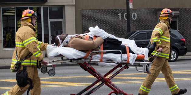A man is stretchered after a commuter train derailed at Atlantic Terminal in Brooklyn, New York City, U.S., January 4, 2017. REUTERS/Alex Wroblewski