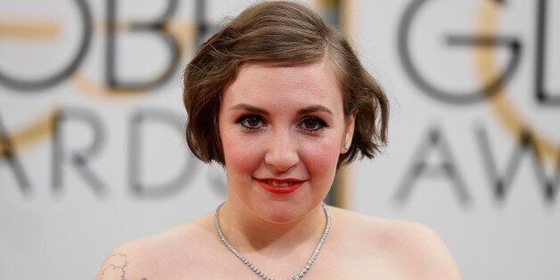 Actress Lena Dunham arrives at the 71st annual Golden Globe Awards in Beverly Hills, California January 12, 2014. REUTERS/Danny Moloshok (UNITED STATES - Tags: Entertainment)(GOLDENGLOBES-ARRIVALS)
