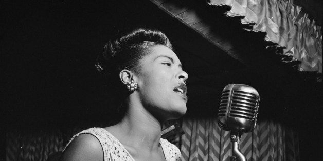 UNITED STATES - February 1947: Photo of American jazz singer Billie Holiday (1915 - 1959) performing at the Club Downbeat in Manhattan. (Photo by William Gottlieb/Redferns)