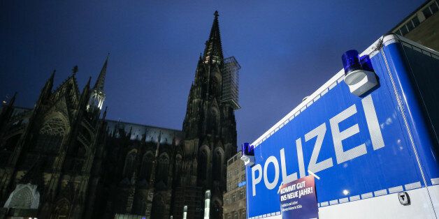 COLOGNE, GERMANY - DECEMBER 31: Police van is seen in front of Cologne Cathedral not far from where on New Year's Eve one year ago hundreds of apparently coordinated sexual assaults were perpetrated against women, prior to New Year's Eve celebrations on December 31, 2016 in Cologne, Germany. City authorities have deployed around 1,500 police officers - more than 10 times last year's number, to maintain security during this year's festivities. Security across Germany is high due also to the recent Berlin terror attack, in which suspect Anis Amri drove a truck into a Christmas market and killed 12 people. (Photo by Maja Hitij/Getty Images)