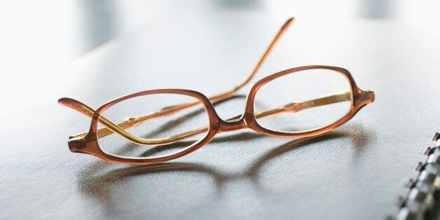 Eyeglasses and notebook
