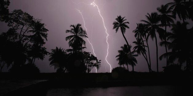 Lightning strikes over Lake Maracaibo in the village of Ologa, where the Catatumbo River feeds into the lake, in the western state of Zulia October 23, 2014. This year the Catatumbo Lightning was approved for inclusion in the 2015 edition of Guinness World Records, dethroning the Congolese town of Kifuka as the place with the world's most lightning bolts per square kilometer each year at 250. Scientists think the Catatumbo, named for a river that runs into the lake, is normal lightning that just happens to occur far more than anywhere else, due to local topography and wind patterns. Picture taken with long exposure October 23, 2014. REUTERS/Jorge Silva (VENEZUELA - Tags: SOCIETY ENVIRONMENT TPX IMAGES OF THE DAY)ATTENTION EDITORS: PICTURE 10 OF 20 FOR WIDER IMAGE PACKAGE 'VENEZUELA'S ETERNAL STORM' TO FIND ALL IMAGES SEARCH 'CATATUMBO LIGHTNING'
