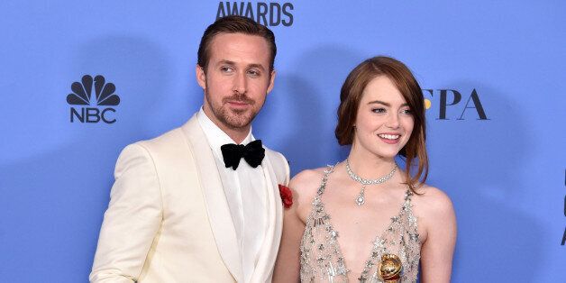 BEVERLY HILLS, CA - JANUARY 08: Actor Ryan Gosling (L) and actress Emma Stone pose in the press room during the 74th Annual Golden Globe Awards at The Beverly Hilton Hotel on January 8, 2017 in Beverly Hills, California. (Photo by Alberto E. Rodriguez/Getty Images)