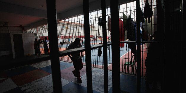 MANAUS, BRAZIL - FEBRUARY 18: Inmates gather in the overcrowded Puraquequara prison on February 18, 2016 in Manaus, Brazil. The prison holds nearly 1,400 inmates, around twice as many as it was designed for. Brazil now holds the fourth-largest prison population in the world, behind the U.S., Russia and China, with the number of Brazilians behind bars nearly doubling in the past decade. The prison system currently holds more than 600,000 inmates, 61 percent over capacity, according to Human Rights Watch. (Photo by Mario Tama/Getty Images)