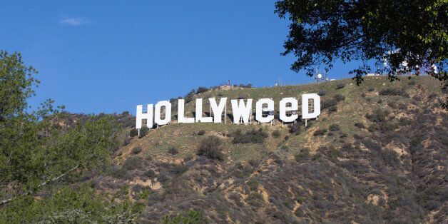 HOLLYWOOD, CA - JANUARY 01: The Iconic Hollywood Sign Gets Changed To Read 'Hollyweed' on January 1, 2017 in Hollywood, California. (Photo by Gabriel Olsen/Getty Images)