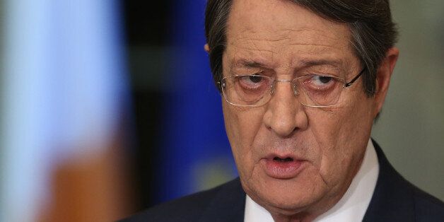 Cyprus President Nicos Anastasiades speaks during a nationally televised news conference at the presidential palace in Nicosia on November 23, 2016. Crunch negotiations on ending the decades-old division of Cyprus broke down with its rival leaders still far apart and no date set for a new round of UN-brokered talks. It was the second round of intensive meetings this month between Greek Cypriot leader Nicos Anastasiades and his Turkish Cypriot counterpart Mustafa Akinci. / AFP / POOL / Petros Karadjias (Photo credit should read PETROS KARADJIAS/AFP/Getty Images)