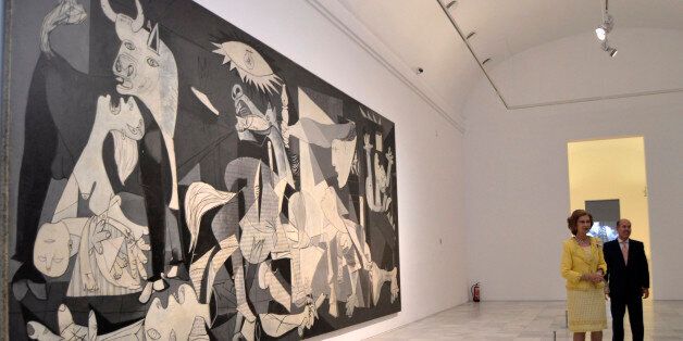 MADRID, SPAIN - OCTOBER 02: Queen Sofia views Guernica by Pablo Picasso at 'Encuentros Con Los Anos Treinta' exhibition at Queen Sofia National Museum on October 2, 2012 in Madrid, Spain. (Photo by Europa Press/Europa Press via Getty Images)