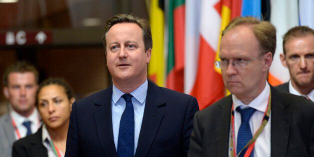 British Prime Minister David Cameron (C) and Britain's ambassador to the European Union, Ivan Rogers (2R), leave after the first day of an EU - Summit at the EU headquarters in Brussels on June 28, 2016.European Union leaders will on June 29, 2016 assess the damage from Britain's decision to leave the bloc and try to prevent further disintegration, as they meet for the first time without a British representative. / AFP / THIERRY CHARLIER (Photo credit should read THIERRY CHARLIER/AFP/Getty Images)