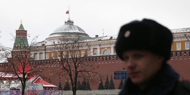 MOSCOW, RUSSIA - DECEMBER 26, 2016: A Russian flag lowered to half-staff above a Moscow Kremlin building as Russia's President Vladimir Putin declares December 26, 2016 the Day of National Mourning for the victims of the Tupolev Tu-154 plane crash off Sochi coastline a day earlier. The plane of Russia's Defence Ministry bound for Russia's Hmeymim air base in Syria, was carrying members of the Alexandrov Ensemble, Russian servicemen and journalists, and Yelizaveta Glinka (known as Doctor Liza), Spravedlivaya Pomoshch [Just Aid] International Public Organisation director. Artyom Geodakyan/TASS (Photo by Artyom Geodakyan\TASS via Getty Images)