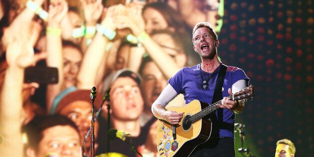SYDNEY, AUSTRALIA - DECEMBER 13: Chris Martin of Coldplay performs at Allianz Stadium on December 13, 2016 in Sydney, Australia. (Photo by Mark Metcalfe/WireImage)