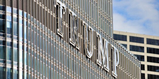 A view of a portion of Chicago's second tallest skyscraper, Trump Tower, with a focus on its large identity sign. The Trump Tower sign was added long after the structure opened and it triggered a local controversy when installed.