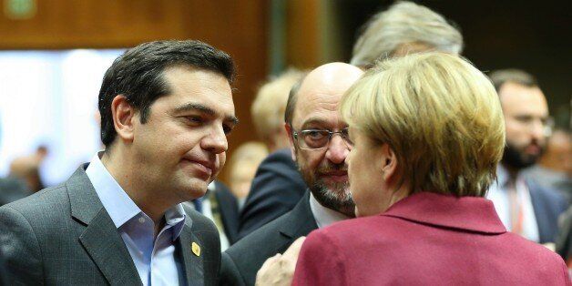 BRUSSELS, BELGIUM - DECEMBER 15: German Chancellor Angela Merkel (R) and Greek Prime Minister Alexis Tsipras attend the European Union (EU) Leaders Summit in Brussels, Belgium on December 15, 2016. EU Leaders discussed Ukraine, Syria, Brexit during the summit. (Photo by Dursun Aydemir/Anadolu Agency/Getty Images)