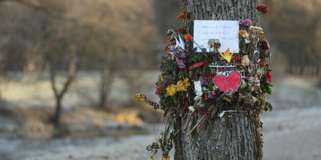 FREIBURG IM BREISGAU, GERMANY - DECEMBER 08: Flowers and messages left by mourners adorn a tree near the spot where Maria L., a 19-year-old medical student, was raped and murdered on December 8, 2016 in Freiburg im Breisgau, Germany. Police have arrested Hussein K., a refugee from Afghanistan who was 16 at the time of the October murder, after identifying him through CCTV camera images and DNA evidence. The likely fact that a refugee is responsible for the murder has grown into a political issue, with a local branch of the right-wing AfD (Alternative fuer Deutschland) political party quick to point a finger at what they deem as Germany's over-liberal policy on admitting over one million refugees and migrants since 2015. Meanwhile critics have blasted German television station ARD for failing to report on the arrest in its Tagesschau news broadcast in what many right-leaning analysts see as pro-refugee bias by the media. (Photo by Sean Gallup/Getty Images)