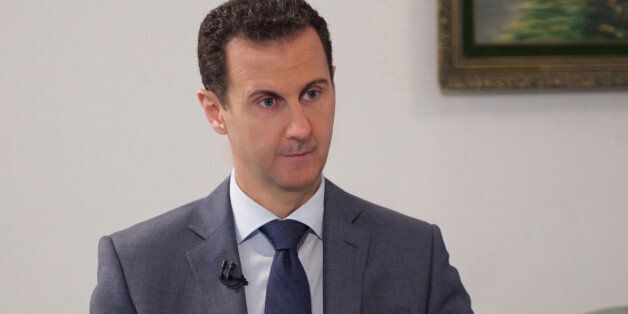 Syria's President Bashar al-Assad speaks during an interview with al-Watan newspaper in Damascus, Syria, in this handout picture provided by SANA on December 8, 2016. SANA/Handout via REUTERS ATTENTION EDITORS - THIS IMAGE WAS PROVIDED BY A THIRD PARTY. EDITORIAL USE ONLY. REUTERS IS UNABLE TO INDEPENDENTLY VERIFY THIS IMAGE.