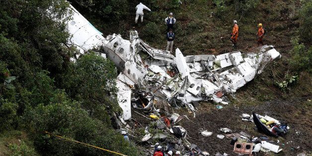 ATTENTION EDITORS - VISUAL COVERAGE OF SCENES OF INJURY OR DEATHRescue crew work at the wreckage of a plane that crashed into the Colombian jungle with Brazilian soccer team Chapecoense onboard near Medellin, Colombia, November 29, 2016. REUTERS/Jaime Saldarriaga