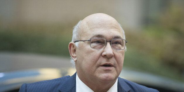 Michel Sapin, France's finance minister, arrives ahead of a Eurogroup meeting of European finance ministers in Brussels, Belgium, on Monday, Dec. 5, 2016. Since Greece's debt triggered a wave of shocks that spooked investors in Europe more than six years ago, EU governments -- led by Angela Merkel's Germany, the bloc's largest economy -- have been pursuing an austerity-first agenda; not only raising taxes, slashing spending and striving to narrow deficits themselves but demanding other nations do likewise. Photographer: Jasper Juinen/Bloomberg via Getty Images