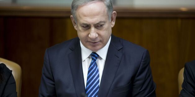 Israeli Prime Minister Benjamin Netanyahu chairs the weekly cabinet meeting at his office in Jerusalem on December 11, 2016. / AFP / POOL / ABIR SULTAN (Photo credit should read ABIR SULTAN/AFP/Getty Images)