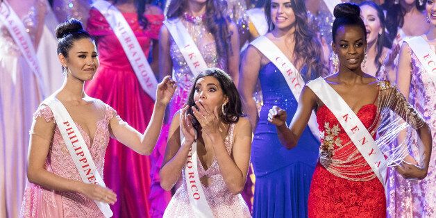 Miss Puerto Rico Stephanie Del Valle (C) reacts after winning in the Grand Final of the Miss World 2016 pageant at the MGM National Harbor December 18, 2016 in Oxon Hill, Maryland. / AFP / ZACH GIBSON (Photo credit should read ZACH GIBSON/AFP/Getty Images)