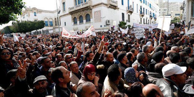 Teachers and professors gather in front of the Ministry of Education to protest against the budget for 2017, in Tunis, Tunisia November 30, 2016. REUTERS/Zoubeir Souissi