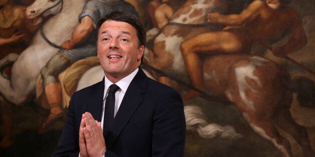 Outgoing Italian Prime Minister Matteo Renzi gestures during the bell ceremony, to signify the start of the first cabinet meeting of the newly appointed Italian Prime Minister Paolo Gentiloni, at Chigi Palace in Rome, Italy December 12, 2016. REUTERS/Alessandro Bianchi