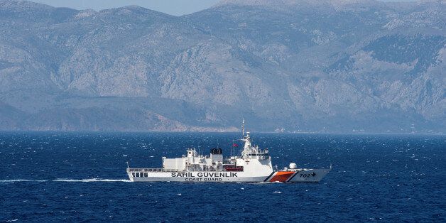 A Turkish coast guard ship patrols in the Aegean Sea, off the Turkish coast, April 20, 2016. The Bonn is part of a NATO naval presence in the Aegean Sea meant to observe and monitor illegal naval movement between Turkey and Greece. REUTERS/John MacDougall/Pool