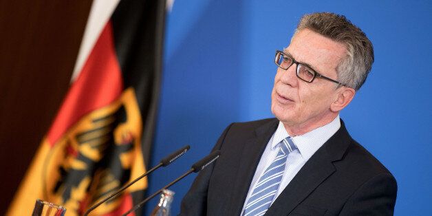 German Interior Minister Thomas de Maiziere adresses the media at the interior ministry in Berlin,Â Germany, Thursday, Dec. 15, 2016. An Afghan asylum-seeker suspected of raping and killing a 19-year-old university student in Freiburg was also convicted of attempting to kill another woman in Greece but was released early from prison, de Maiziere said Thursday. (Kay Nietfeld/dpa via AP)