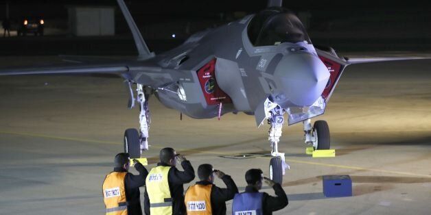 A F-35 fighter jet is seen after landing in the Israeli Nevatim Air force base in the Negev desert, near the southern city of Beer-Sheva, on December 12, 2016. The arrival of the first two US F-35 stealth fighters bought by Israel landed at an air base in the Jewish state after a six-hour delay due to bad weather in Italy on December 12. While other countries have ordered the planes, Israel -- which receives more than $3 billion a year in US defence aid -- says it will be the first outside the United States with an operational F-35 squadron. / AFP / JACK GUEZ (Photo credit should read JACK GUEZ/AFP/Getty Images)