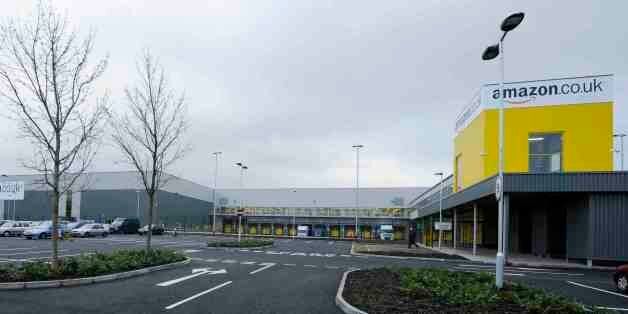 Amazon's new fulfilment centre is seen after it was opened by Scotland's First Minister Alex Salmond in Dunfermline, Scotland, November 15, 2011.The warehouse covers more than one million square feet (93,000 square metres), about the size of 14 soccer pitches, and is Amazon?s biggest in the United Kingdom. It will create 750 permanent jobs, along with a further 1,500 temporary jobs during peak periods. REUTERS/Russell Cheyne (BRITAIN - Tags: POLITICS BUSINESS)