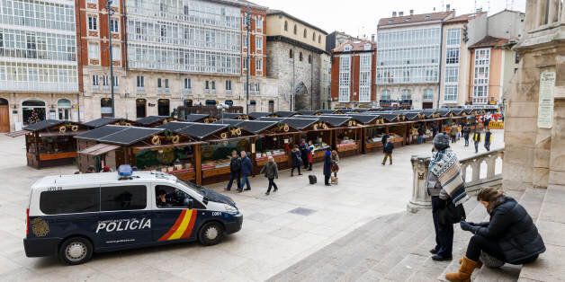 A police car patrols at the Christmas market in Burgos on December 21, 2016.Twelve people were killed when the Polish-registered articulated truck, laden with steel beams, slammed into the crowded holiday market late on December 19, 2016 in Berlin, smashing wooden stalls and crushing victims. The scenes revived nightmarish memories of the July 14 truck assault in the French Riviera city of Nice, where 86 people were killed by a Tunisian Islamist. / AFP / CESAR MANSO (Photo credit should read CESAR MANSO/AFP/Getty Images)