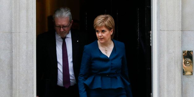 Scottish First Minister Nicola Sturgeon leaves Downing Street, after a meeting with Britain's Prime Minister Theresa May, and the Brexit Secretary David Davies about Britain's decision to leave the EU in London, Monday, Oct. 24, 2016. (AP Photo/Alastair Grant)