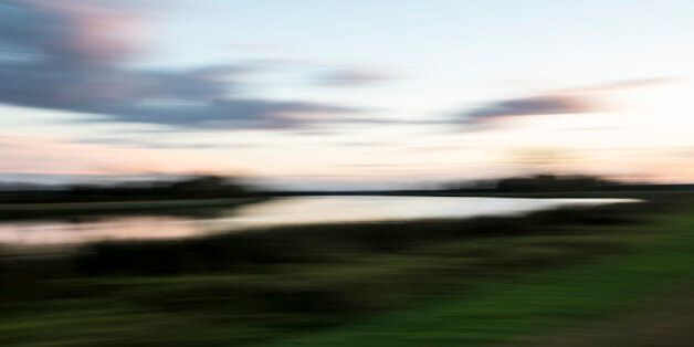 Gartz, Germany - October 02: The river Oder blurs in a long-term exposure, evening atmosphere in the national park Unteres Odertal on October 02, 2016 in Gartz, Germany. (Photo by Thomas Koehler/Photothek via Getty Images)