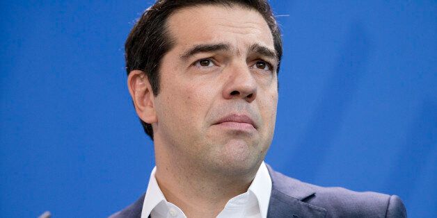 Greek Prime Minister Alexis Tsipras is pictured during a news conference held with German Chancellor Angela Merkel (not in the picture) at the Chancellery in Berlin, Germany on December 16, 2016. (Photo by Emmanuele Contini/NurPhoto via Getty Images)