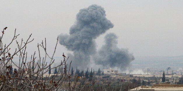 ALEPPO, SYRIA - DECEMBER 21: Smoke rises after Turkish Army's airstrike over Daesh terrorists' positions as Free Syrian Army move forward to the center of al-Bab district during the 'Operation Euphrates Shield' in Aleppo, Syria on December 21, 2016. The anti-Daesh operation called Euphrates Shield, which was launched on August 24, aims at improving security, supporting coalition forces, supporting Syrias territorial integrity and eliminating the terror threat along Turkeys border through Free Syrian Army (FSA) fighters backed by Turkish armor, artillery, and jets. (Photo by Majd El Halebi/Anadolu Agency/Getty Images)