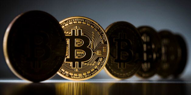 BERLIN, GERMANY - FEBRUARY 15: In this photo illustration model Bitcoins are seen on February 15, 2016 in Berlin, Germany. (Photo Illustration by Thomas Trutschel/Photothek via Getty Images)