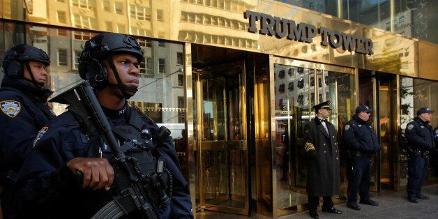 Members of the New York Police Department's Counterterrorism Bureau stand watch outside U.S. Republican presidential nominee Donald Trump's Trump Tower ahead of the U.S. presidential election in Manhattan, New York, U.S., November 7, 2016. REUTERS/Andrew Kelly