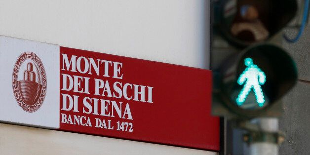 A view of a ' Monte Dei Paschi di Siena ' bank branch in Milan, Italy, Monday, Aug. 1, 2016. Shares in troubled Italian bank Monte dei Paschi di Siena have jumped as investors cheer a rescue deal from private investors that means the bank will not be nationalized. Monte dei Paschi was by far the worst performer in stress tests of 51 European banks but sought to head off any speculation about its future with the announcement late Friday of a 5 billion euro ($5.6 billion) capital injection from investors. (AP Photo/Antonio Calanni)