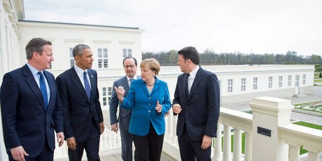 HANOVER, GERMANY - APRIL 25: German Chancellor Angela Merkel greets France's President Francois Hollande, (2nd R) U.S. President Barack Obama, Prime Minister of Great Britain David Cameron (L) and Prime Minister of Italy Matteo Renzi (R) at Schloss Herrenhausen palace on April 25, 2016 in Hanover, Germany. (Photo by Guido Bergmann/Bundesregierung via Getty Images)