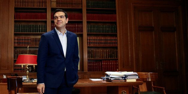 Greek Prime Minister Alexis Tsipras waits for German Foreign Minister Frank-Walter Steinmeier at his office in Maximos Mansion in Athens, Greece, December 5, 2016. REUTERS/Alkis Konstantinidis