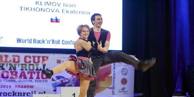 Katerina Tikhonova (L), daughter of Russian President Vladimir Putin, dances with Ivan Klimov during the World Cup Rock'n'Roll Acrobatic Competition in Krakow, Poland April 12, 2014. Picture taken April 12, 2014. To match Special Report RUSSIA-CAPITALISM/DAUGHTERS REUTERS/Jakub Dabrowski TPX IMAGES OF THE DAY