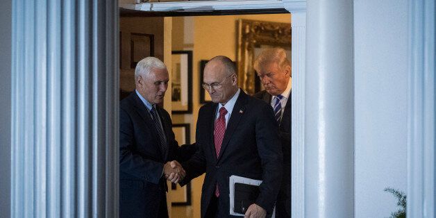 BEDMINSTER TOWNSHIP, NJ - NOVEMBER 19: President-elect Donald Trump, Vice President-elect Mike Pence and Andy Puzder, chief executive of CKE Restaurants, walk out at the clubhouse at Trump National Golf Club Bedminster in Bedminster Township, N.J. on Saturday, Nov. 19, 2016. (Photo by Jabin Botsford/The Washington Post via Getty Images)
